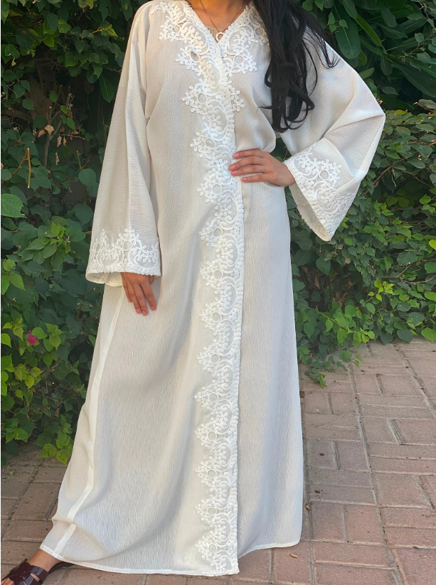 D00347 This dainty and feminine white abaya features a guipure lace ...