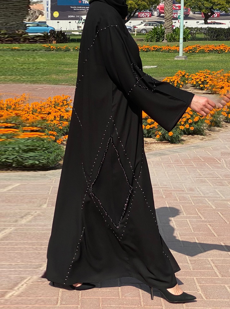 Black Abaya Black abaya in a classic cut, adorned with argyle-pattern