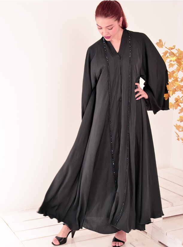 Flowy Abaya Black flowy abaya featuring a swishy hem with wide flared ...