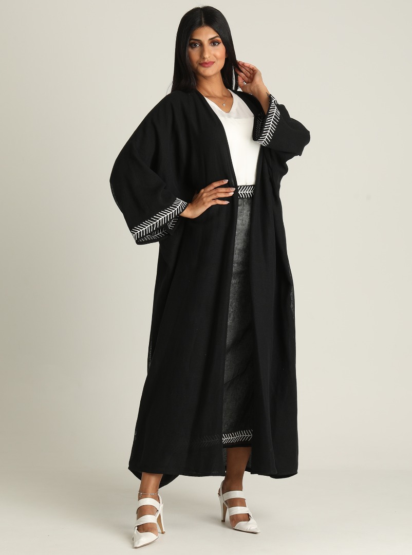 Prestige abaya 2-piece set featuring a black abaya with contrast ...